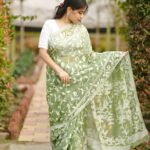 Sheer cotton Jamdani blended with floral motifs