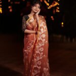 Gorgeous dual tone muslin elevated with floral motifs